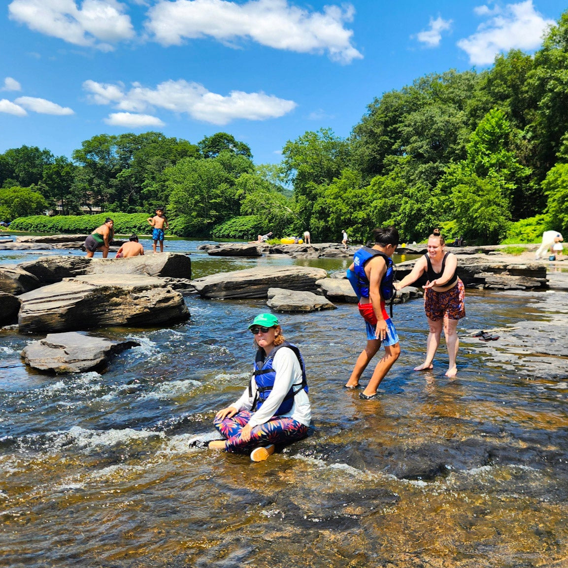 People enjoying a day at Skinner's Falls Rocky Beach 